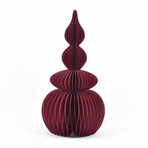 A honeycomb paper christmas tree finial table topper in red.