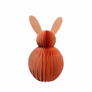 A honeycomb paper christmas tree round rabbit decoration table topper in peach.