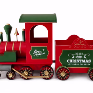 A tin christmas train with engine and one bucket carriage. Decorated in red and green with Christmas messages.